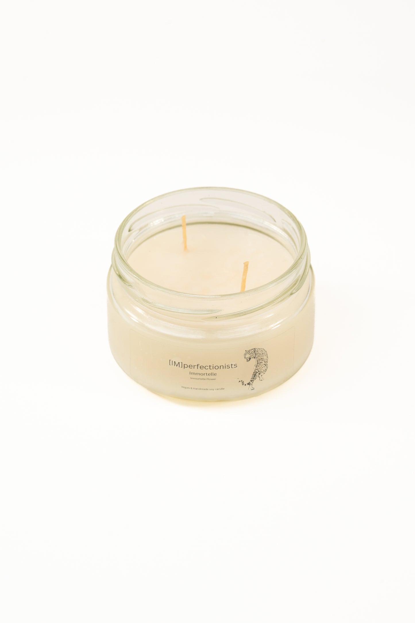 Immortelle Candle Melts into Hand Cream