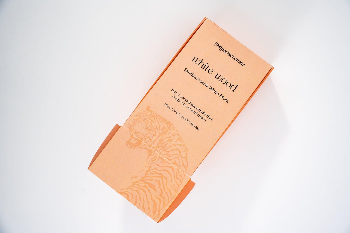 White Wood Candle Melts into hand Cream