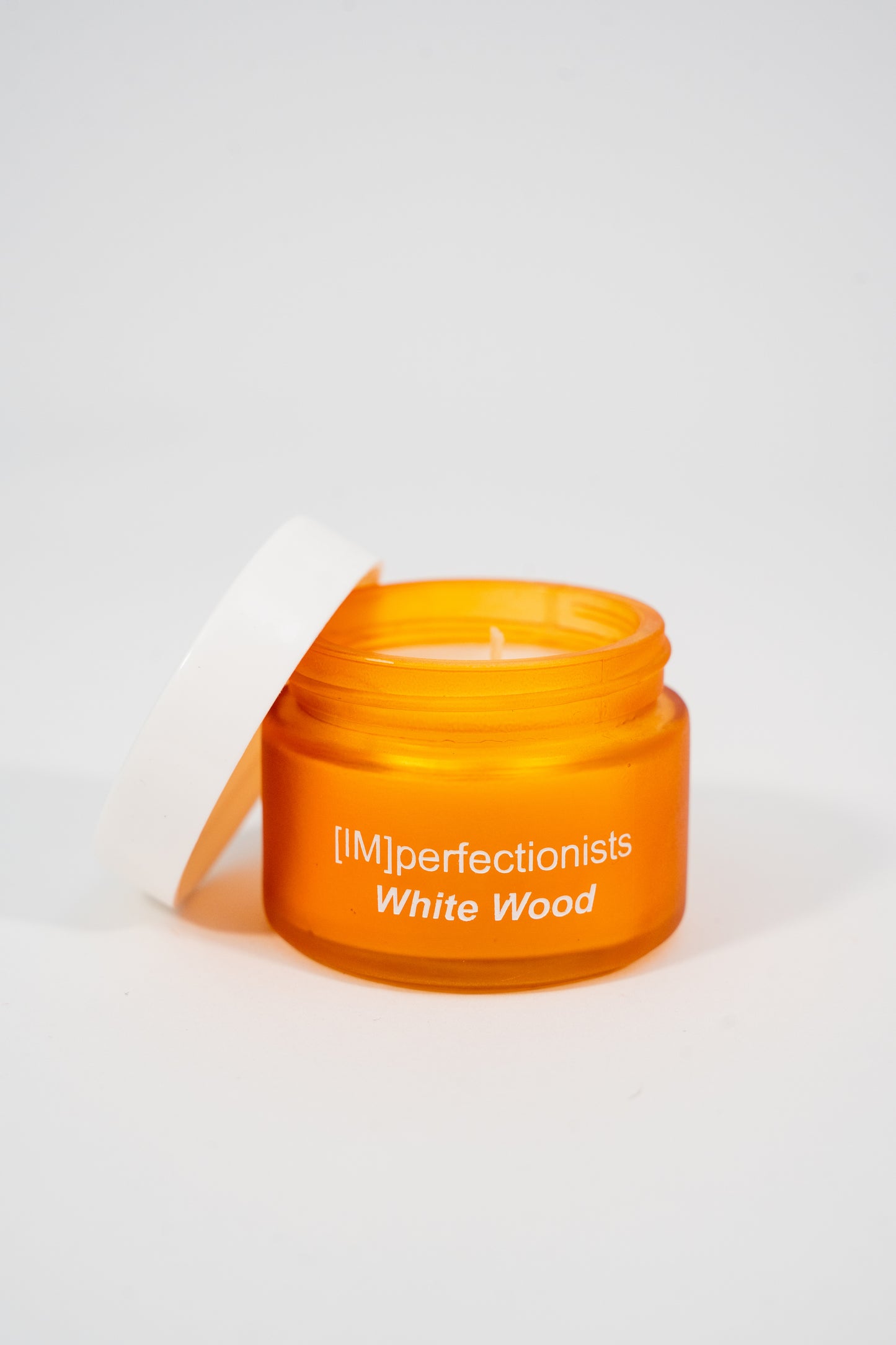 White Wood Candle Melts into hand Cream