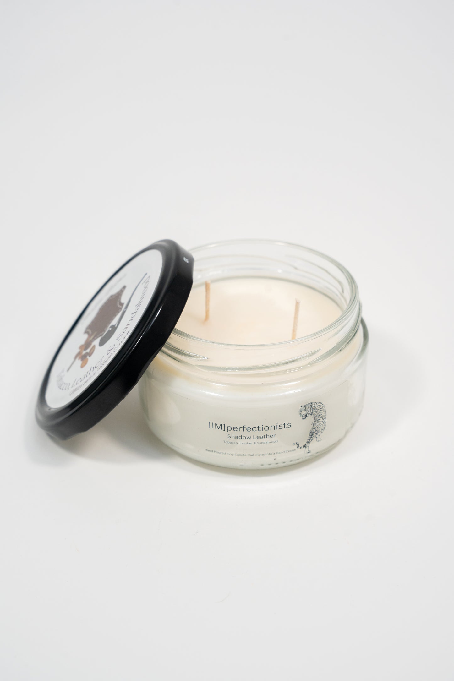 Shadow Leather Candle Melts into Hand Cream